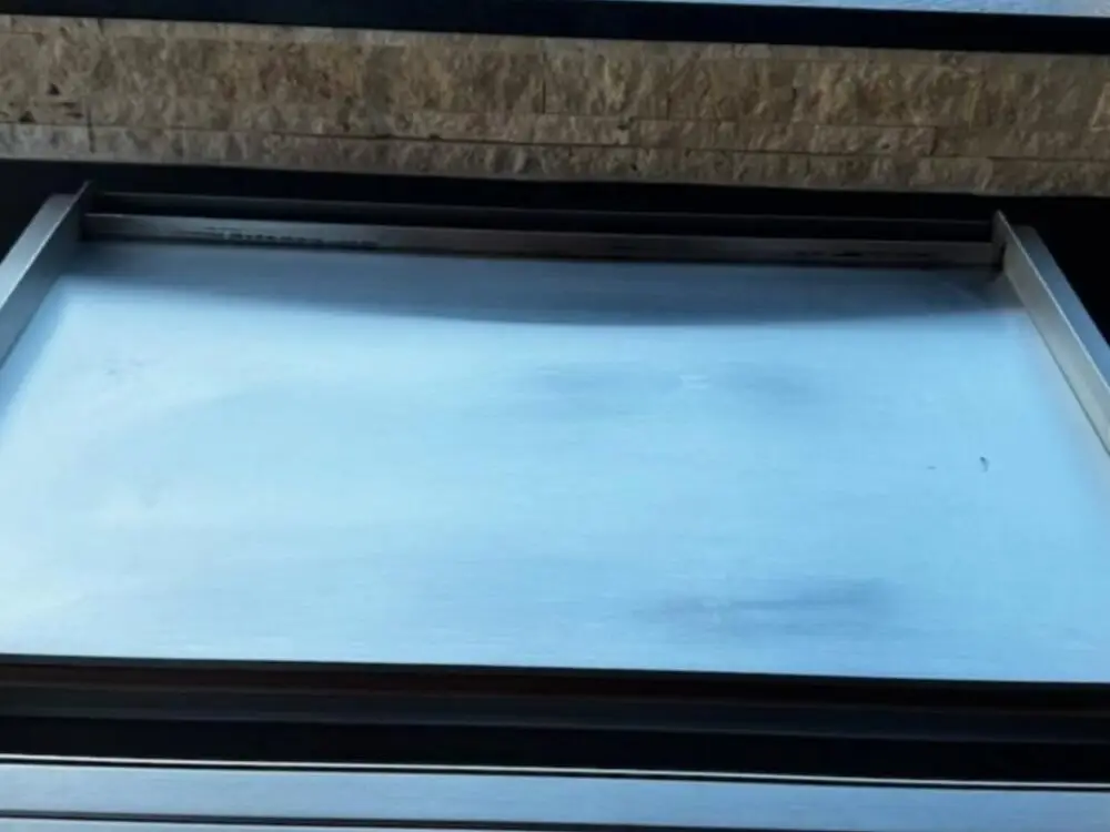 Built-in flattop griddle after cleaning